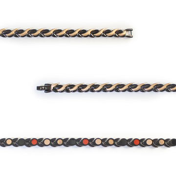 Close-up of Ethereal negative ion bracelet showing detailed black steel links with rose gold waves.